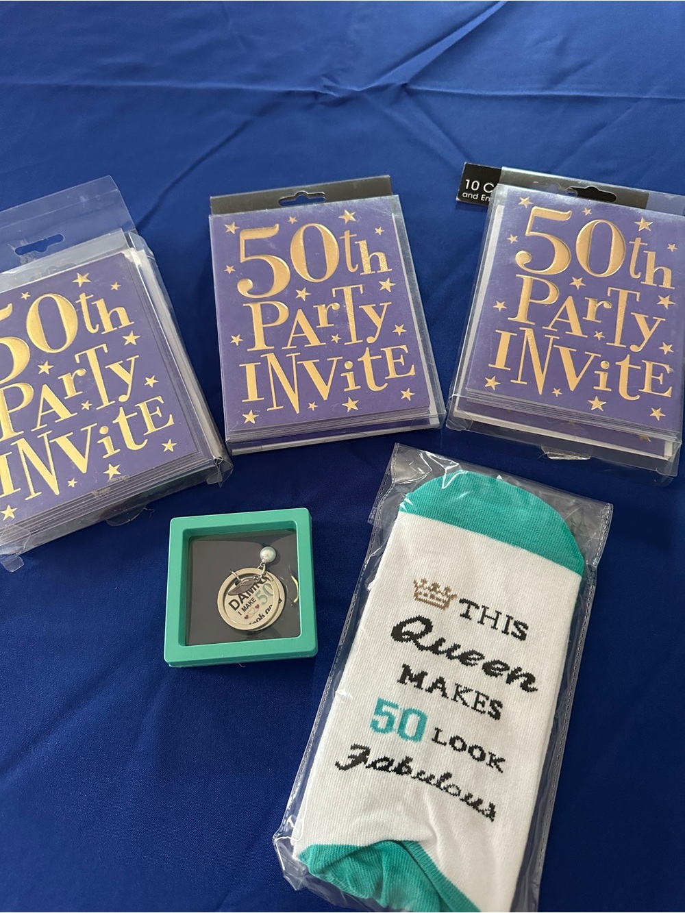 50th birthday set (invites and gifts)